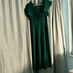 A gorgeous green zip up dress in a size small women’s